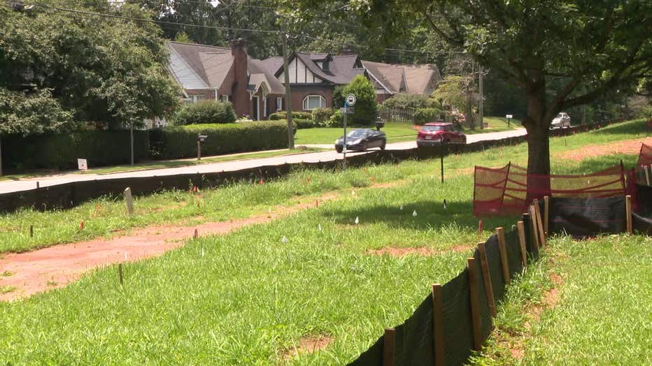 Community members gathered at Legacy Park after nearly three dozen unmarked graves, mostly belonging to children, were found at the former Methodist Children’s Home in DeKalb County on June 24, 2025.