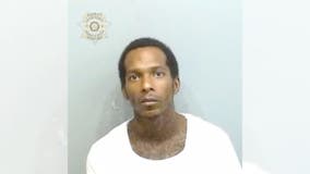 Man charged in 2 Atlanta murders after returning to crime scene