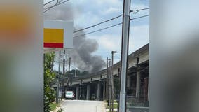 Large brush fire sends black smoke into air near I-85 in NE Atlanta