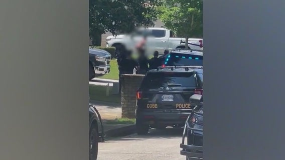 Naked woman taken into custody after SWAT standoff in Powder Springs
