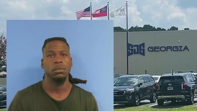 Driver found shot in head on side of I-85 in Troup County, 1 charged