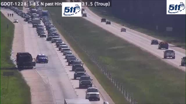 I-85 in Troup County shut down after passenger van catches fire