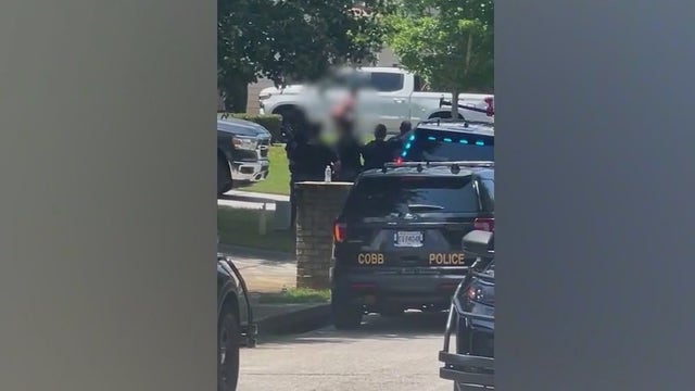 Naked woman taken into custody after SWAT standoff in Powder Springs