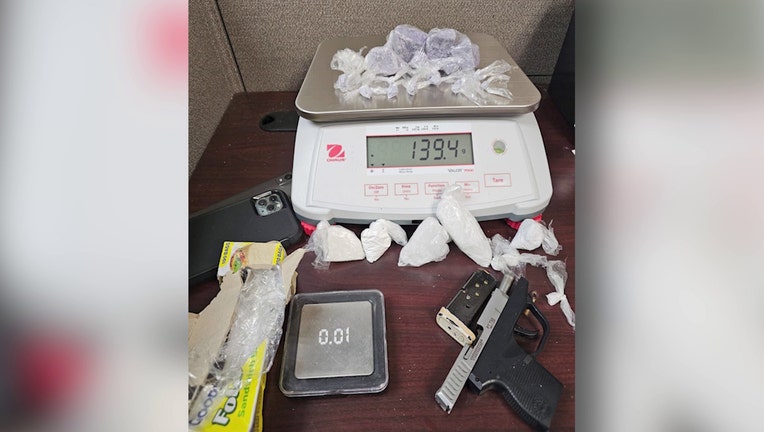 The Athens-Clarke County Police Department released this photo showing items seized during a raid by the Northeast Georgia Regional Drug Task Force and the ACCPD Gang Unit along Danielsville Road in Athens on Dec. 20, 2023.