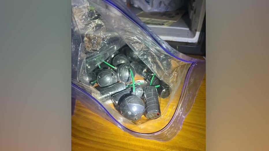 Authorities released this image showing improvised explosive devices found in scrapyard along Hull Avenue in Floyd County on July 16, 2025.