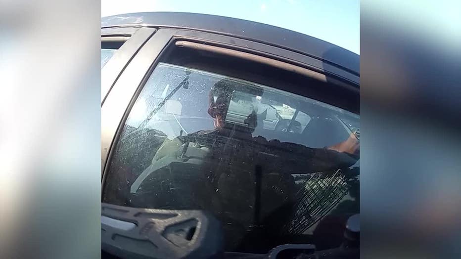 Marietta police officers rescued two dogs from a hot car parked at Six Flags White Water in Marietta on July 5, 2025.