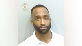 Former Atlanta officer arrested on rape allegation over massage appointment