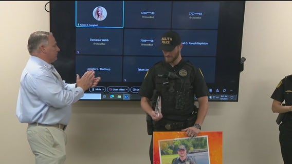 Off-duty officer honored after saving 4-year-old girl from drowning at community pool