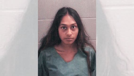 Child rescued from car in Spalding County lake, woman arrested for DUI