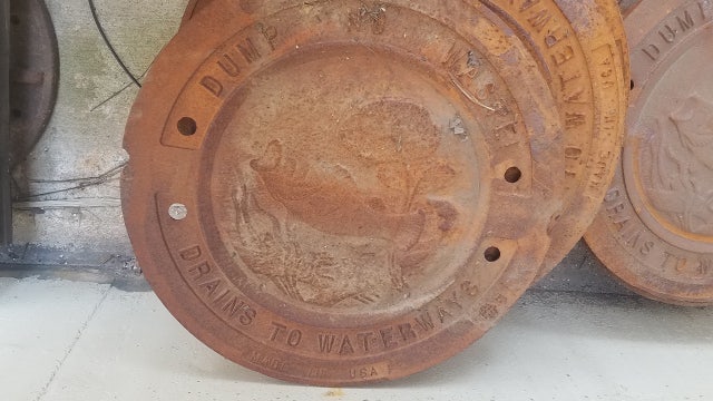Man arrested for stealing dozens of manhole covers