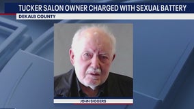 Tucker salon owner charged with two counts of sexual battery
