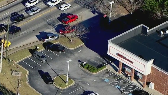 Woman shot in the head at Loganville CVS; person of interest in custody