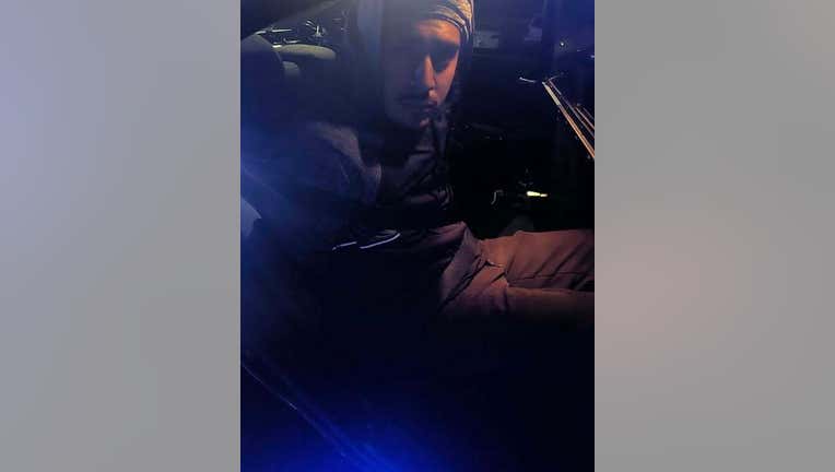 Jayro Nieto sits handcuffed in the backseat of a Toccoa Police Department patrol car after his arrest on Nov. 11, 2025, following a traffic stop that revealed multiple outstanding warrants from Cobb County and Valdosta.