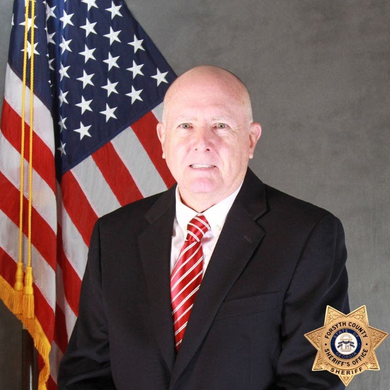 Retired officer killed while directing traffic at Cumming Christmas parade