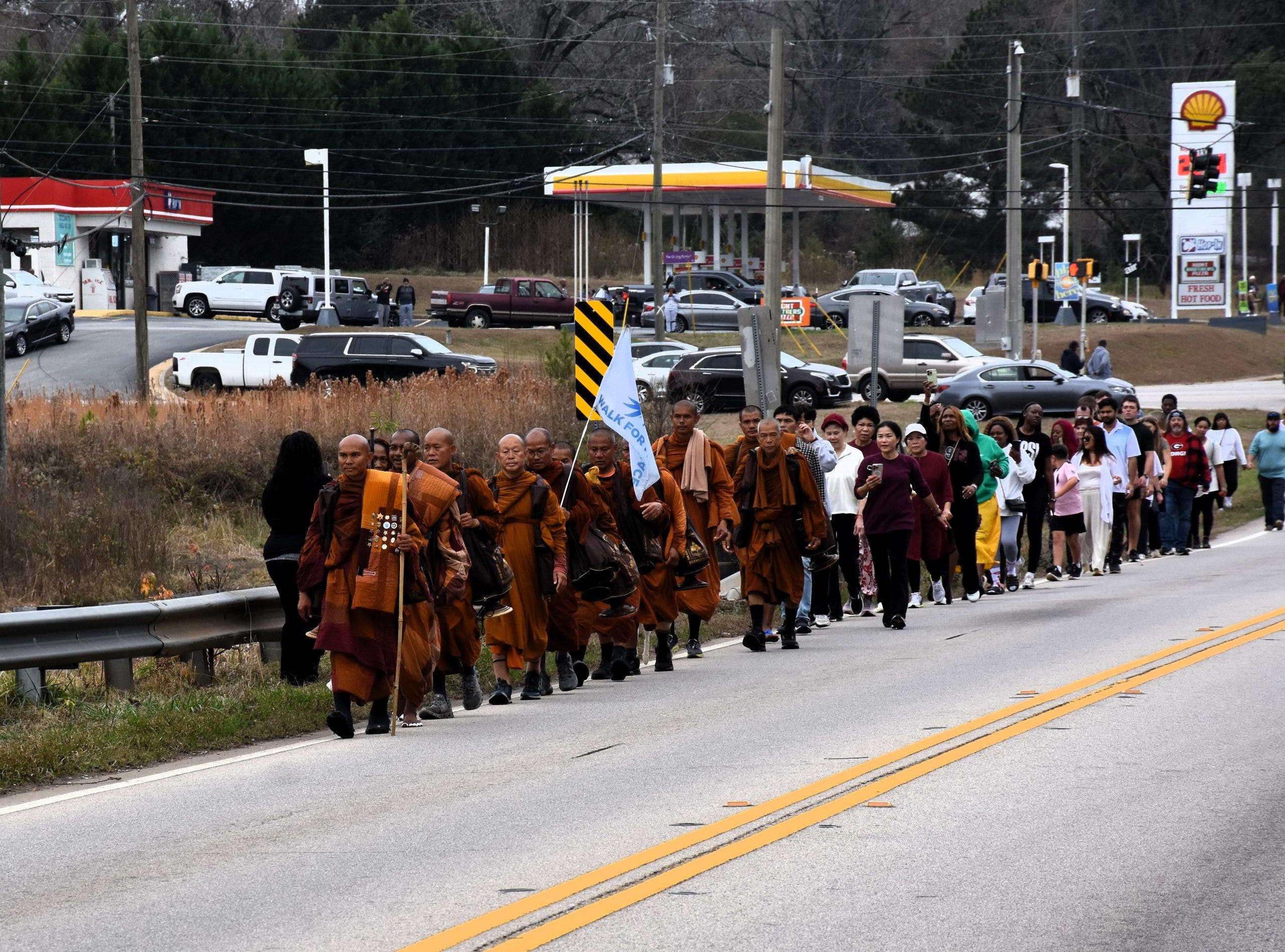 Hundreds gather in LaGrange to meet Buddhist monks on peace walk