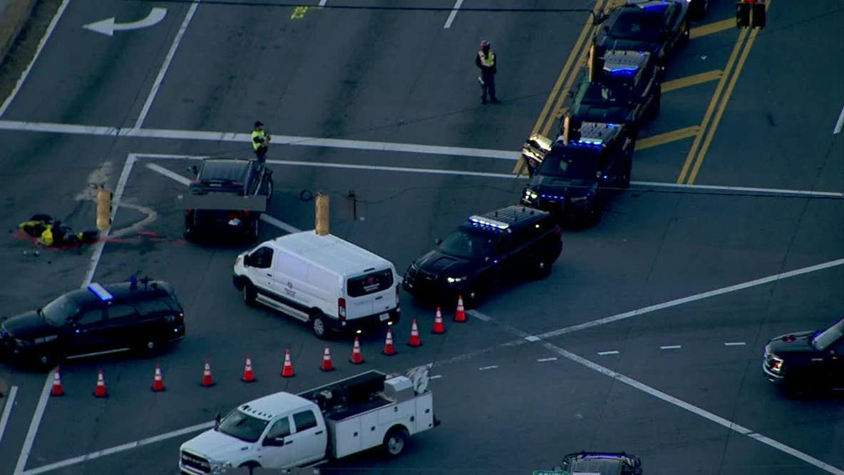 Motorcycle, tractor-trailer crash shuts down South Cobb Drive near I-285