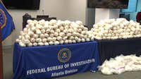 Blackberry shipments hid nearly 1,600 pounds of meth, two convicted criminals charged