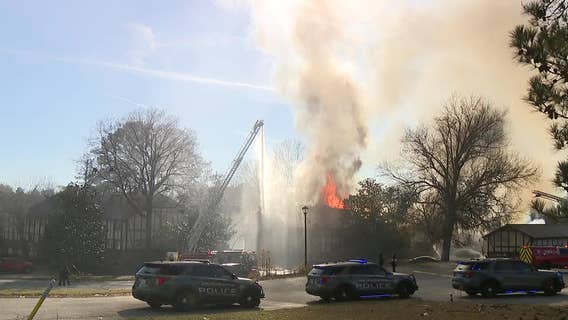 Massive fire tears through Camelot Condominiums in South Fulton