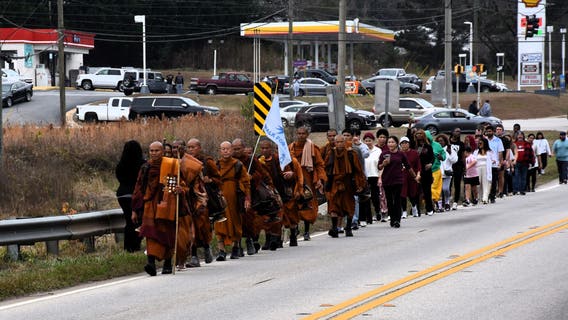 Hundreds gather in LaGrange to meet Buddhist monks on peace walk