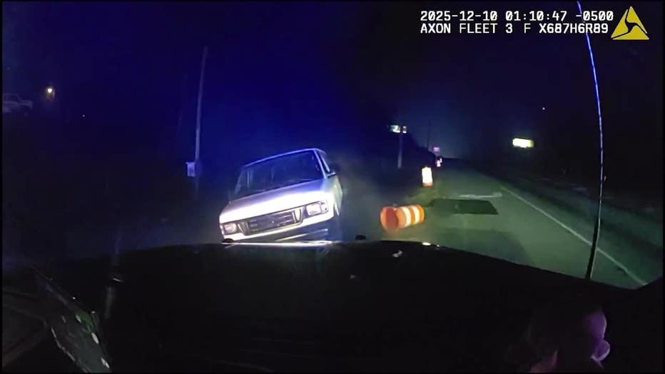 A white panel van sits disabled after a Fayette County deputy used a PIT maneuver to end a high-speed chase that began as a traffic stop and led to drug trafficking arrests in Fayette County on Dec. 10, 2025.