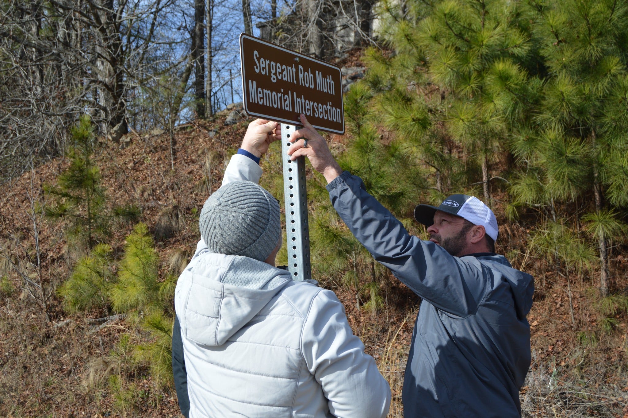 Intersection renamed for retired cop who died after Cumming Christmas parade