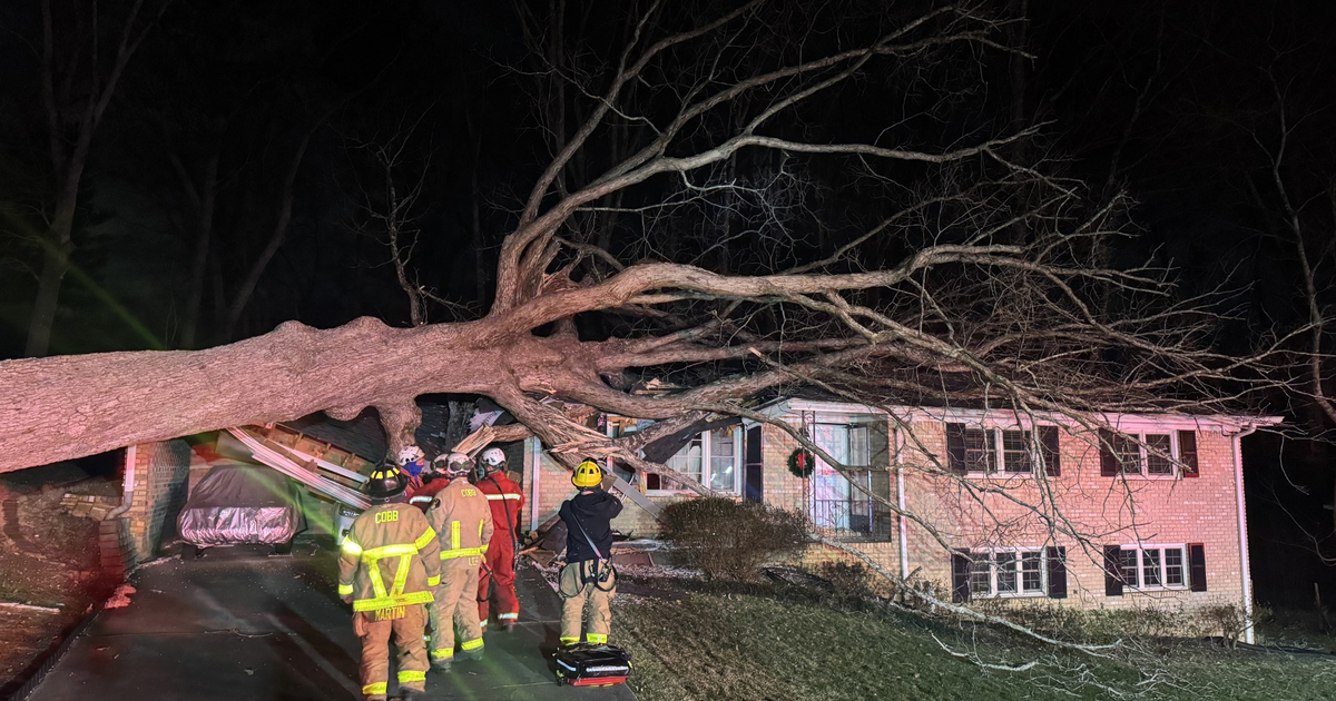 Tree falls on Cobb County home trapping 2 | FOX 5 Atlanta