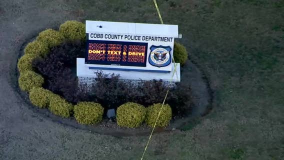 Woman shot by police at Cobb County police headquarters