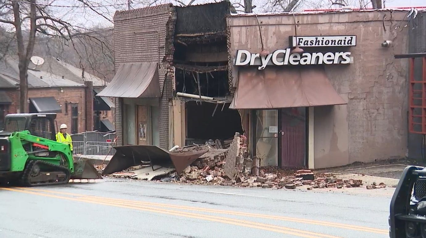 Car crashes into Atlanta dry cleaners causing partial building collapse