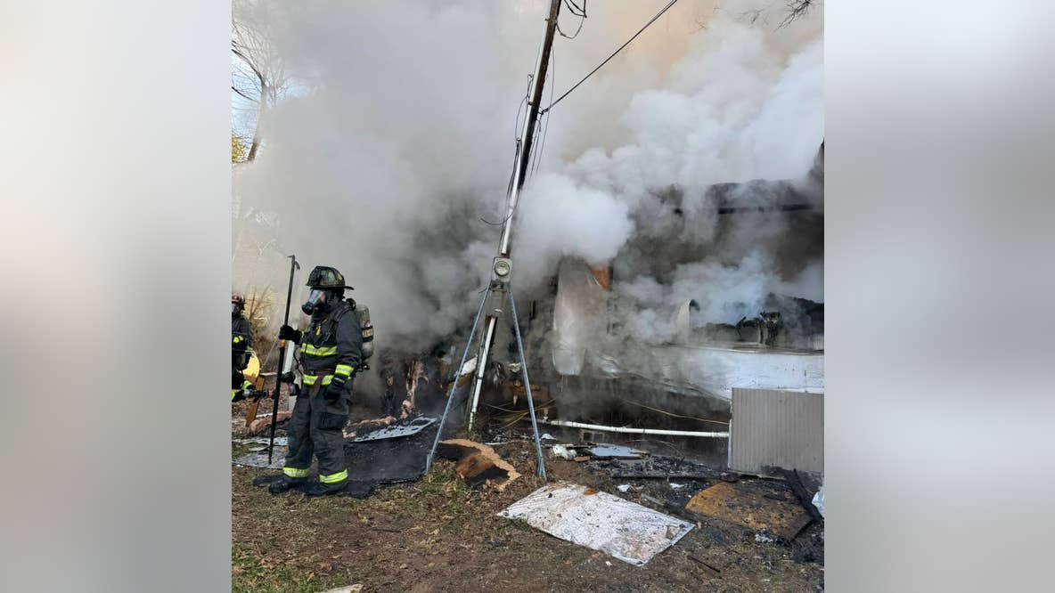 1 hospitalized, dog dies in Cherokee County house fire