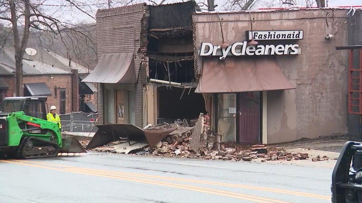 Car crashes into Atlanta dry cleaners causing partial building collapse