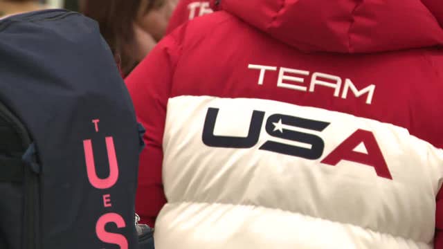 Olympians travel through Atlanta airport after returning from Milan
