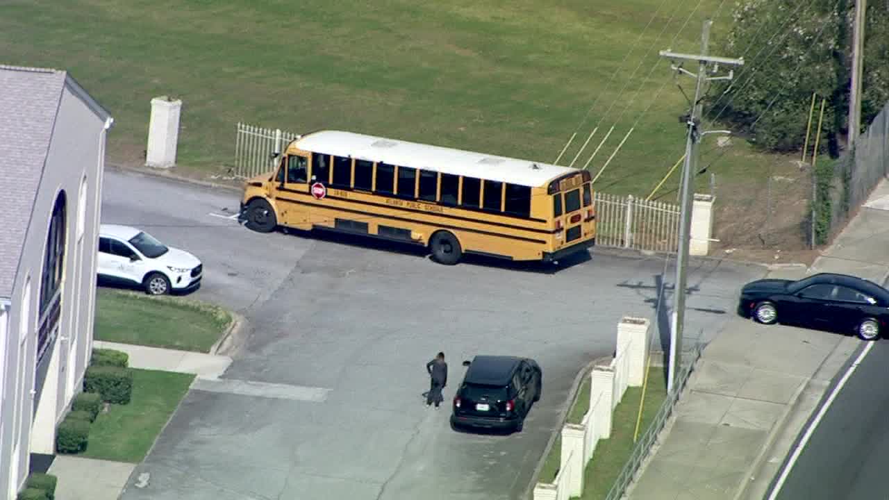 Atlanta school bus damaged in shooting; man injured