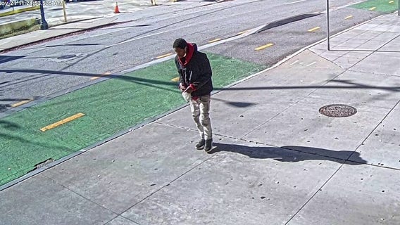 APD search for man accused of punching woman outside World of Coca-Cola