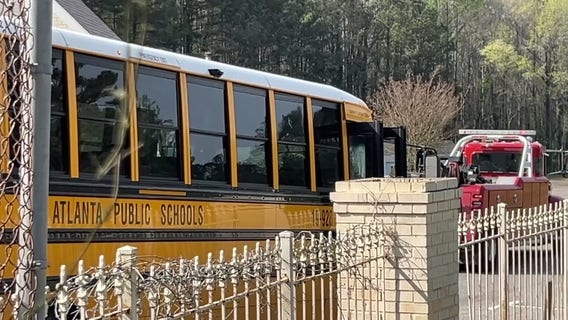 2 students injured on school bus, man shot in Atlanta
