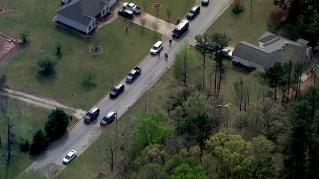 Police: Man fired at residents, broke into Newton home