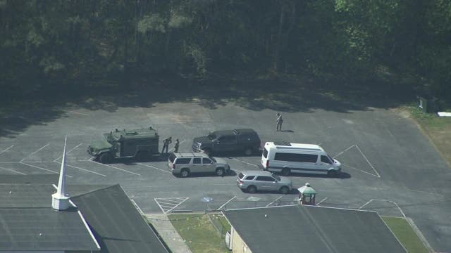 Wanted person at large after DeKalb County raid triggers lockdown