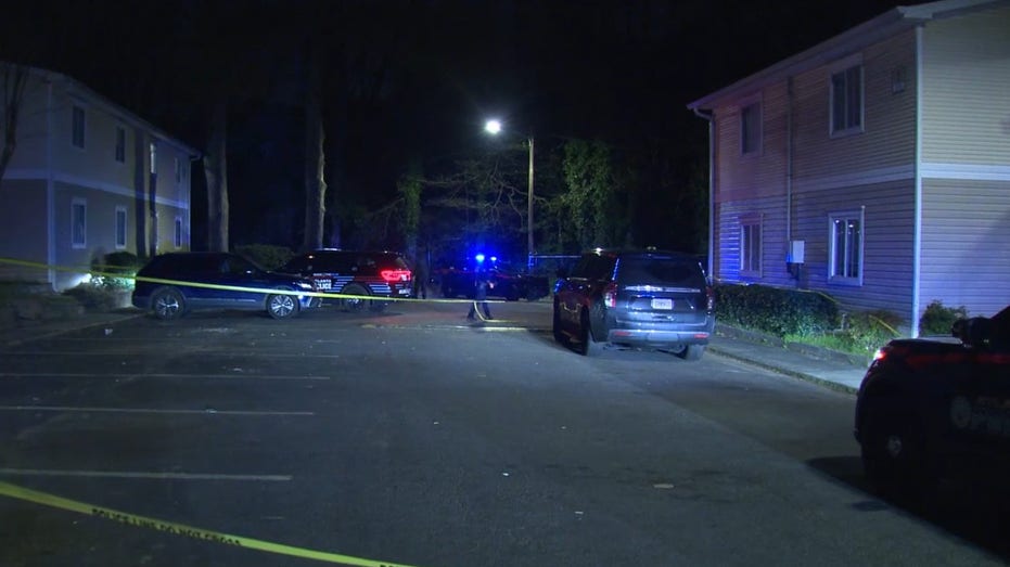 Police vehicles at southwest Atlanta apartment complex