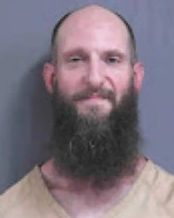 Gordon County man charged with killing service dog