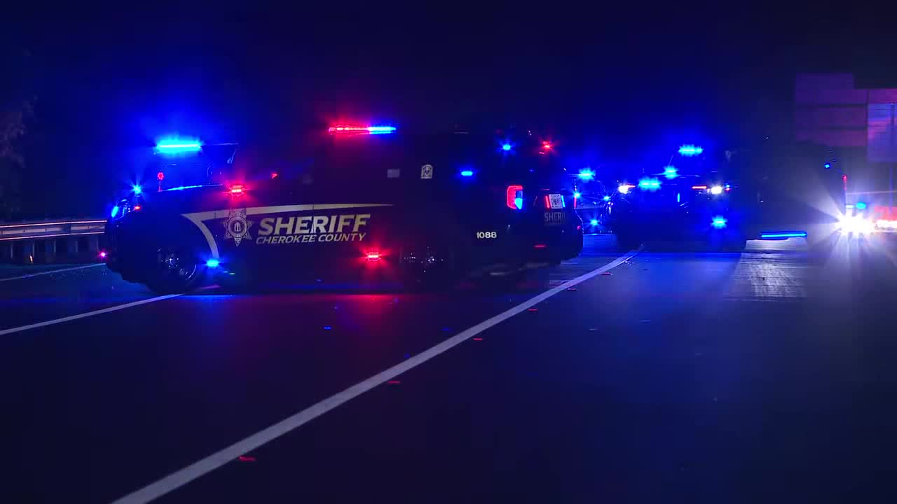 Man dead, officer injured after traffic stop leads to gunfire in Woodstock