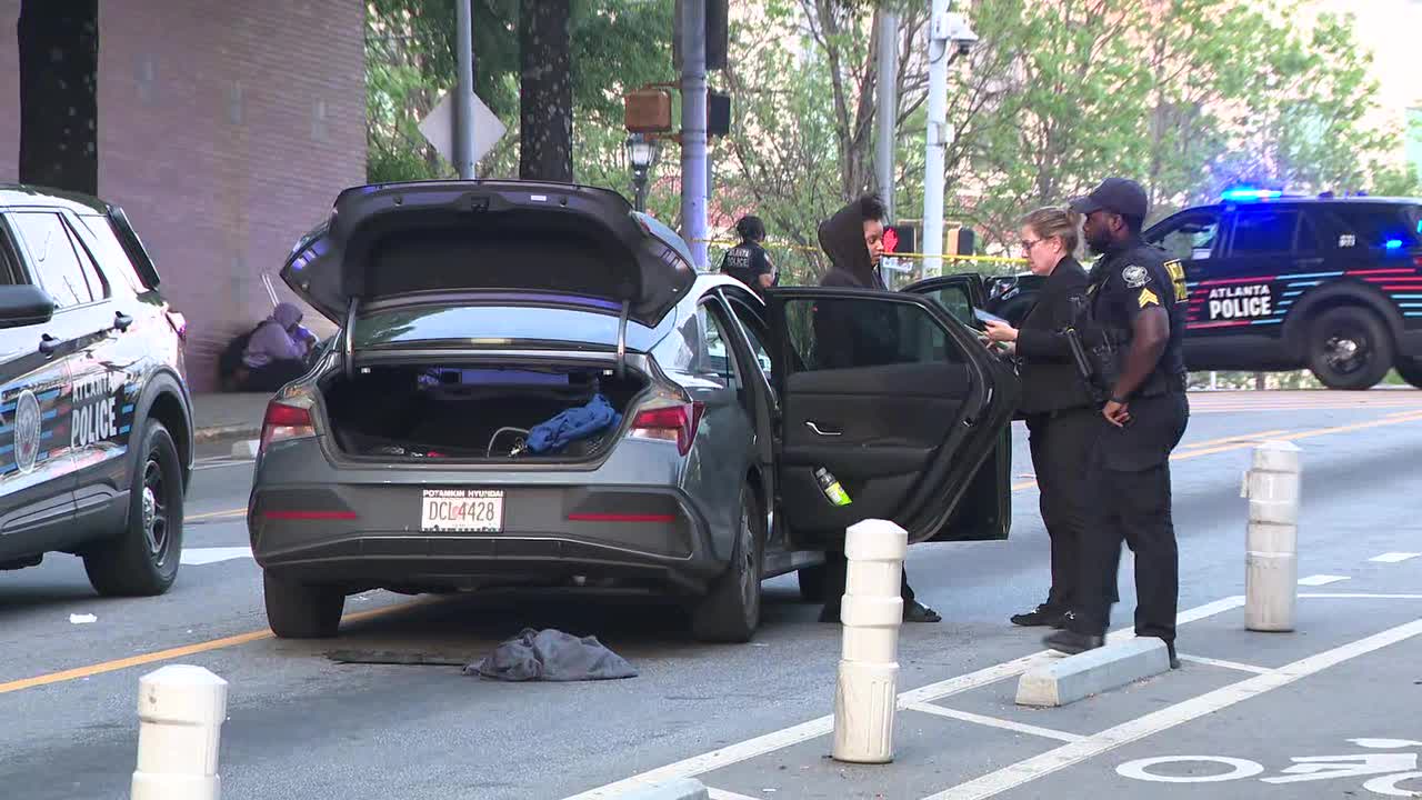 Officer aids Atlanta shooting victim on way to hospital