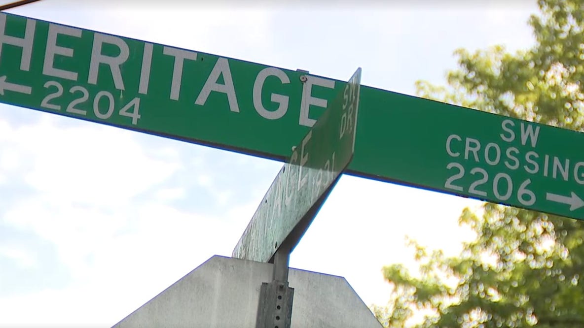 Woman shot to death at Rockdale home; 1 in custody