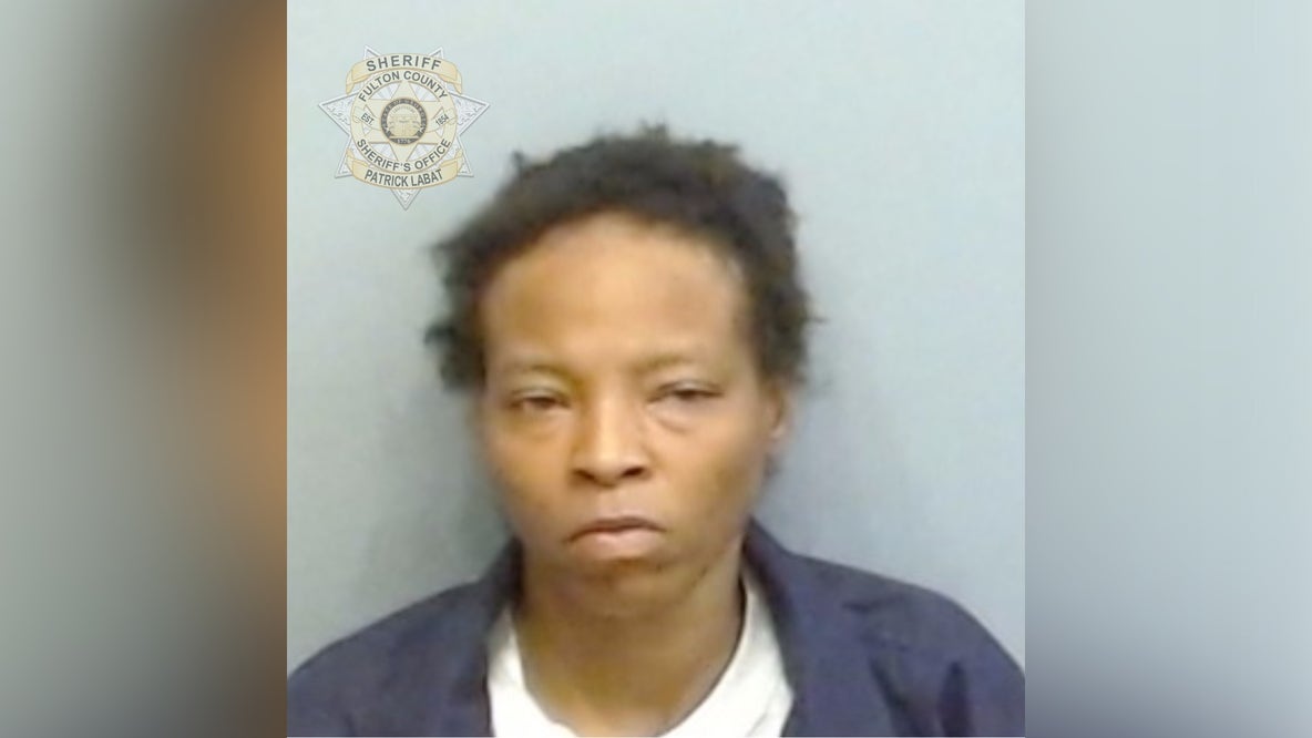 Woman arrested in deadly West Ridge Shopping Center shooting