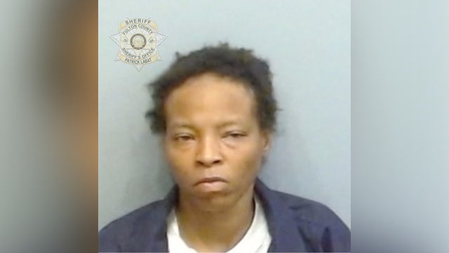 Woman arrested in deadly West Ridge Shopping Center shooting