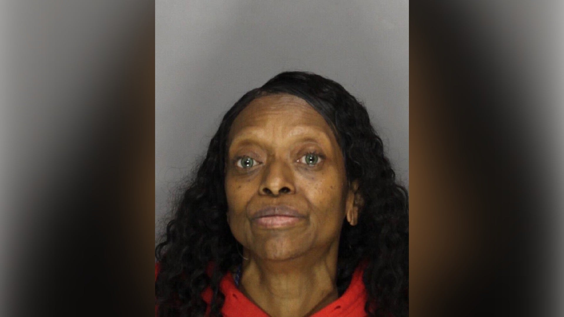 Marietta woman charged in fatal shooting of downstairs neighbor