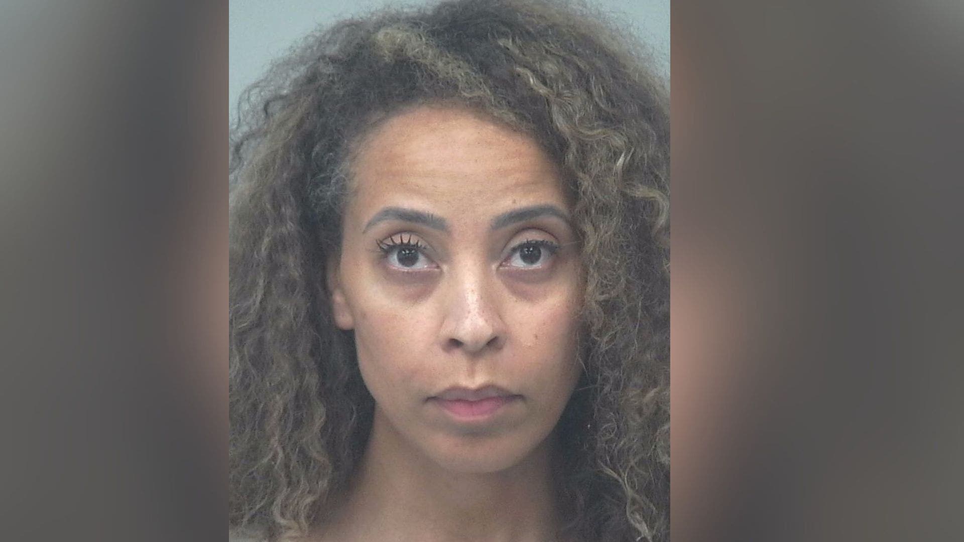 Mug shot of woman arrested for Grayson shooting released
