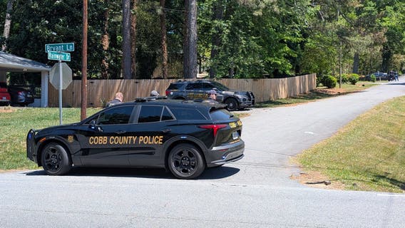 Mother, son found dead after standoff in East Cobb identified
