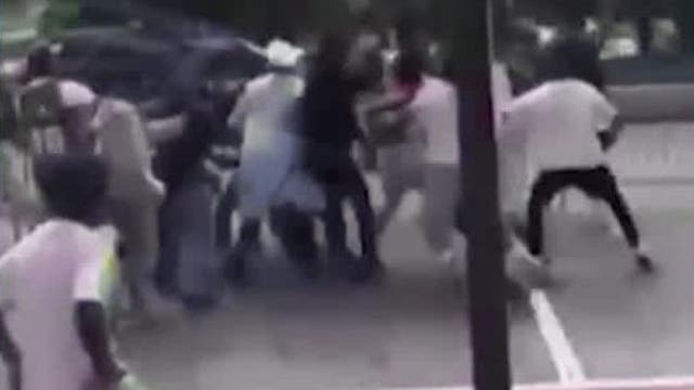 Video shows 'complete mayhem' during Atlanta high school graduation fight
