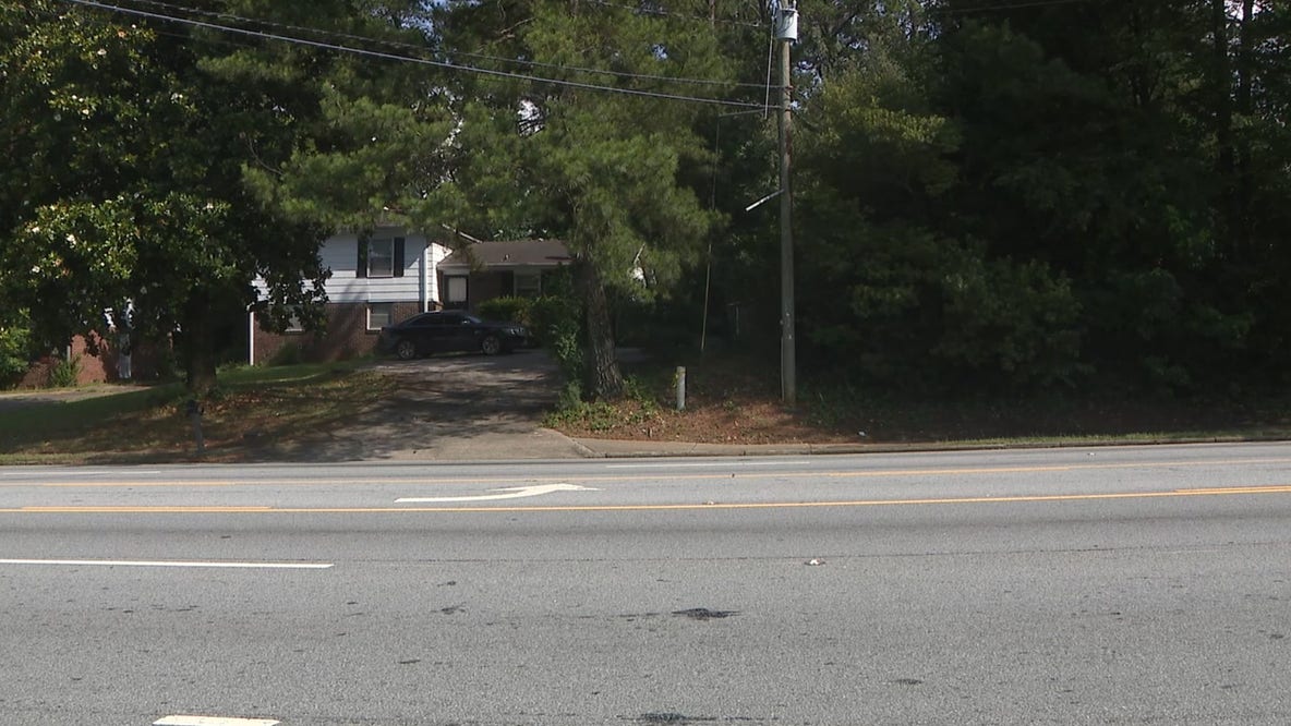 Retired Atlanta police officer found dead in driveway, family says