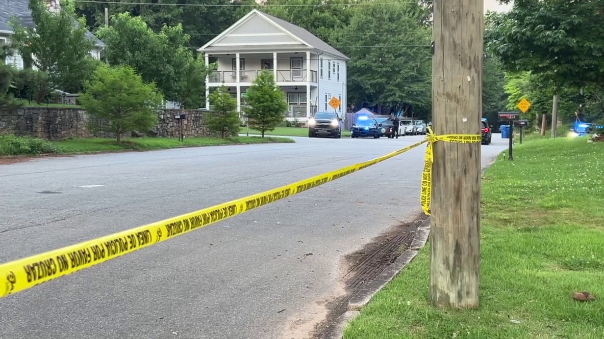 Police swarm Mims Street SW after wanted suspect runs into home