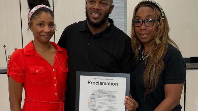 Couple honored for rescuing driver from Atlanta floodwaters